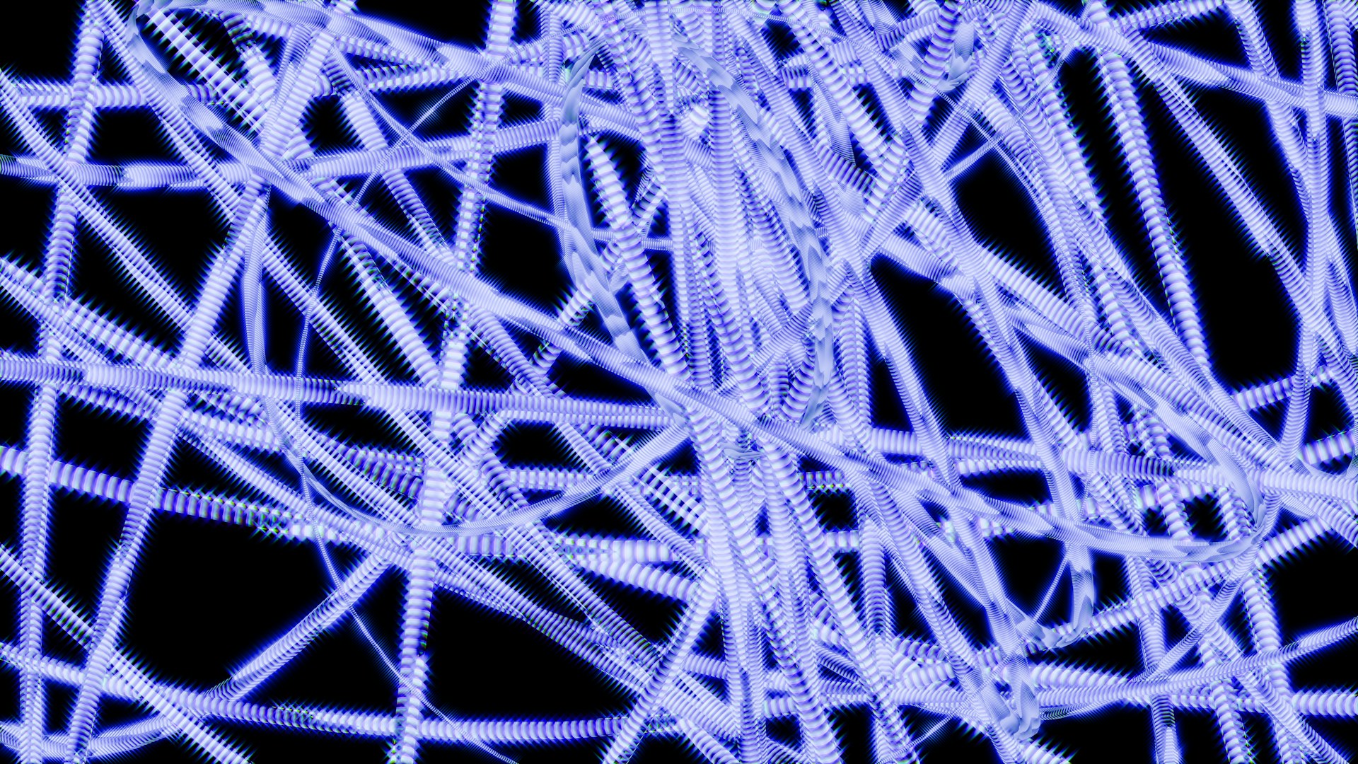 A dense tangle of pale coiled filaments crossing one another at every angle, with no common direction, against black